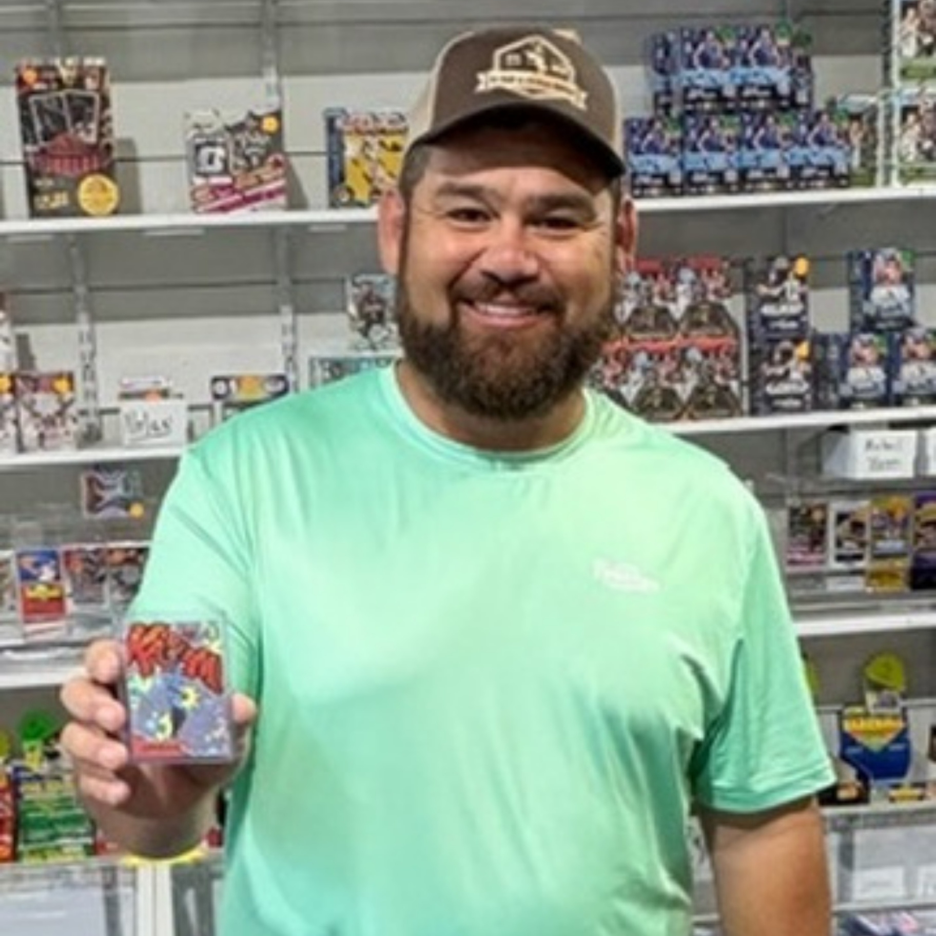 Customer showing a card he pulled at the shop